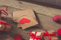 Valentine's day, wedding zero waste, eco-friendly gift wrapping kraft paper and branches with hearts, gift basket, cozy winter winter evening eco concept eco-friendly banner decor