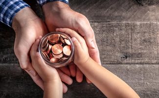 Hands_holding_savings_money