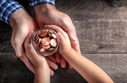 Hands_holding_savings_money