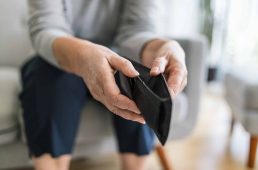 Desperate elderly woman unhappy with the rising cost of living